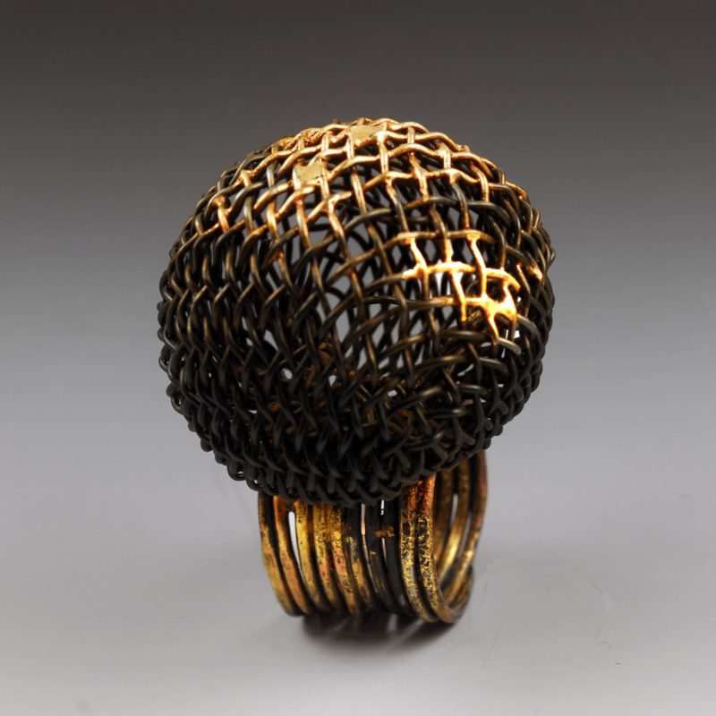 jewelry with gold fused to steel mesh